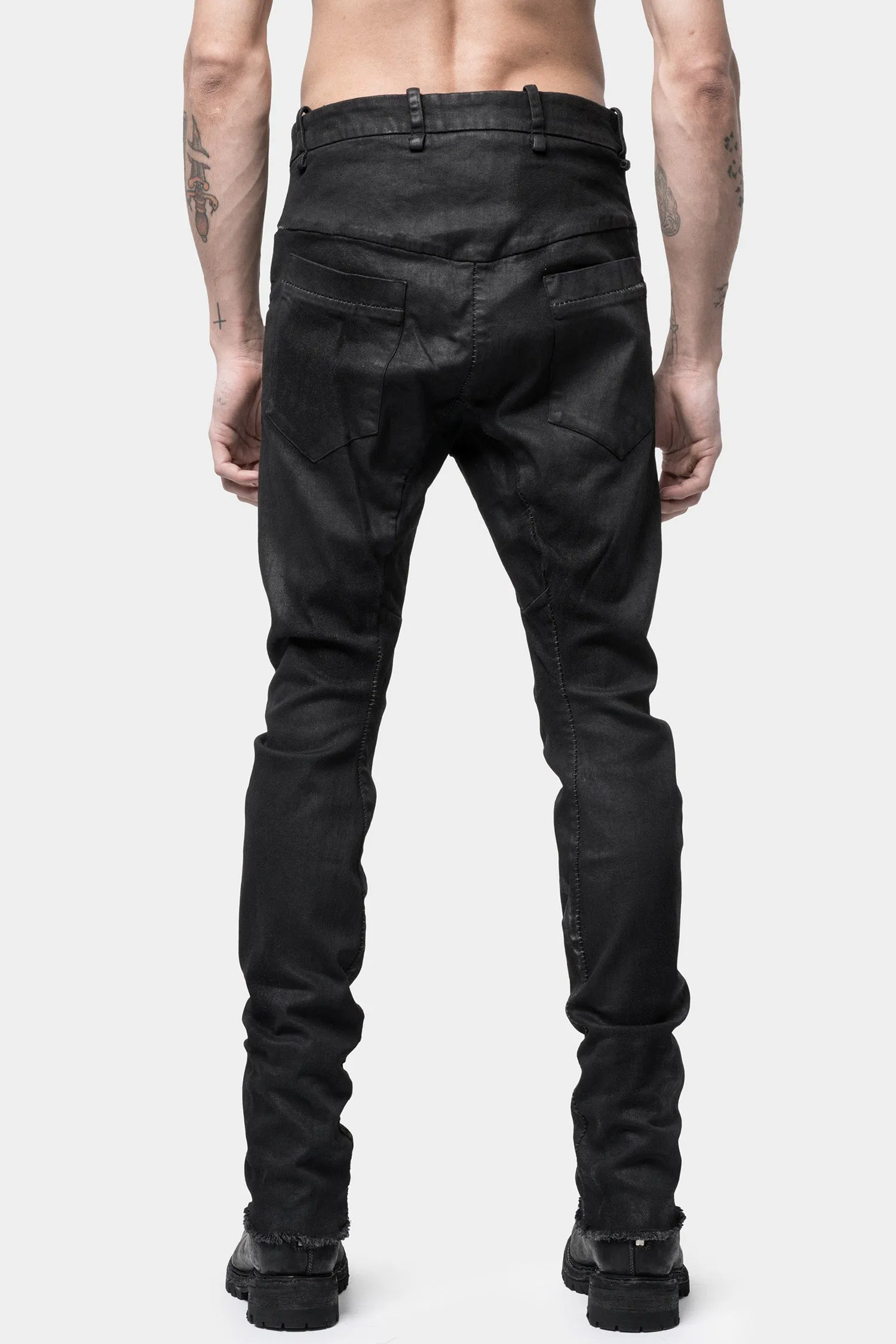 Layered pocket resinated jeans