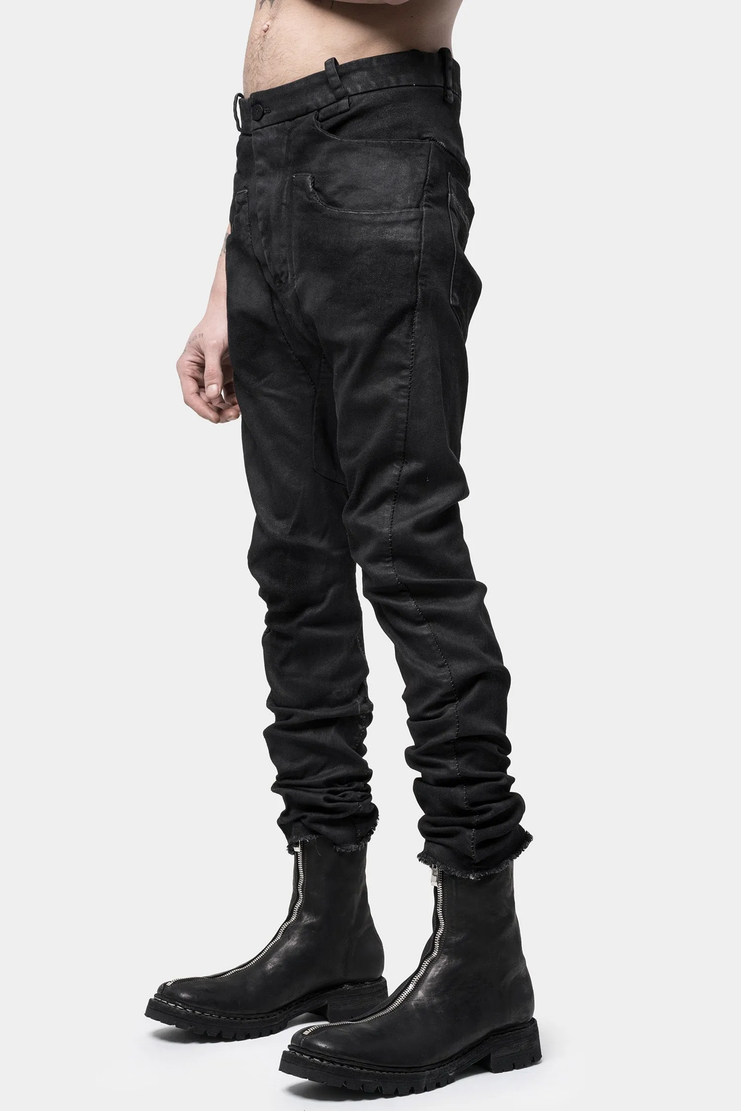 Layered pocket resinated jeans