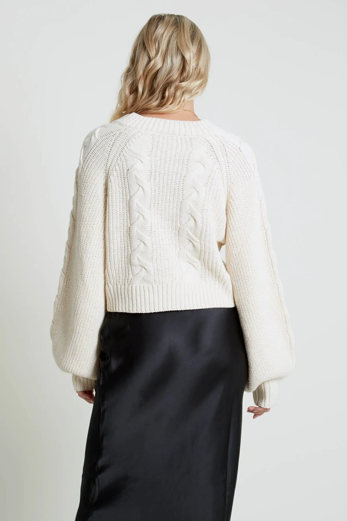 QATI CABLE KNIT V-NECK JUMPER WITH BLOUSON SLEEVE